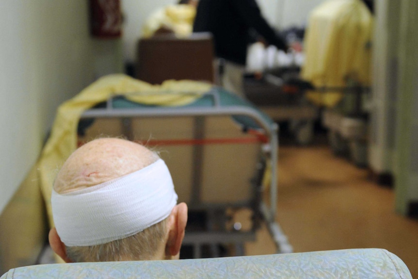 Elderly man in hospital