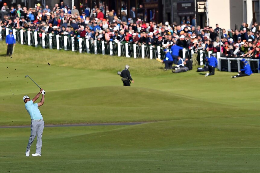 Jason Day hits off the fairway at British Open