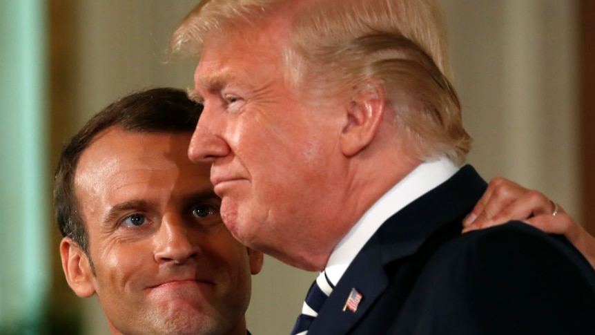 Donald Trump and Emmanuel Macron bro fist shake