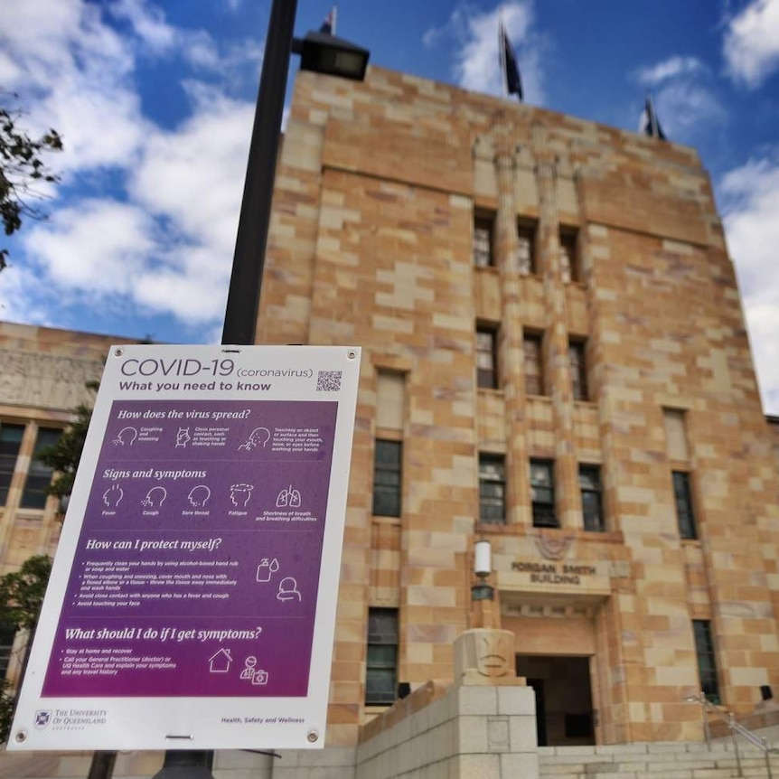 COVID-19 sign at University of Queensland outside Forgan Smith Building in Brisbane.