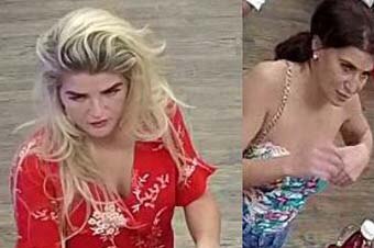 CCTV stills of two woman wanted by Queensland police being served at a shop.