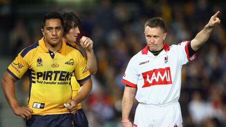 Early shower ... Fuifui Moimoi leaves the field after being sent off by Steve Clark