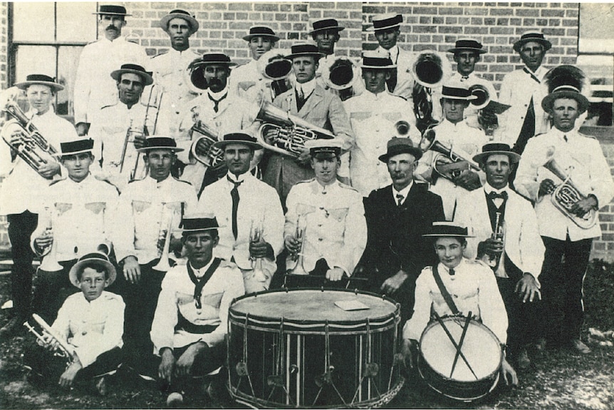 A black and white image of a brass band in 1913.