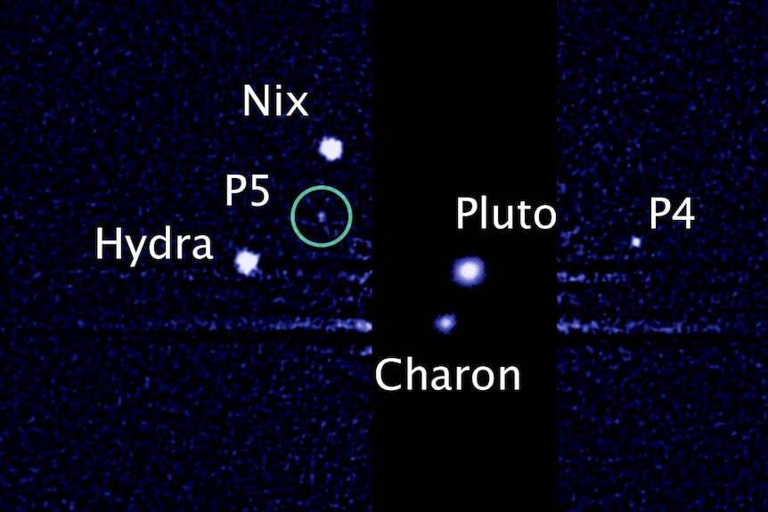 NASA's Hubble Space Telescope shows five moons orbiting Pluto. The green circle marks the newly discovered moon P5