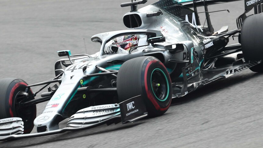 Lewis Hamilton steers his Mercedes around a corner