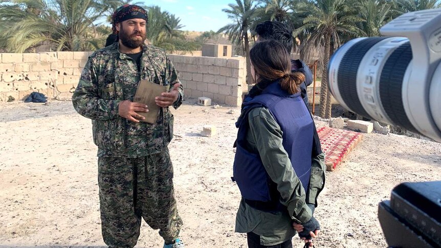 SDF Commander Simko Shikaki talks to reporter Yaara Bou Melhem.