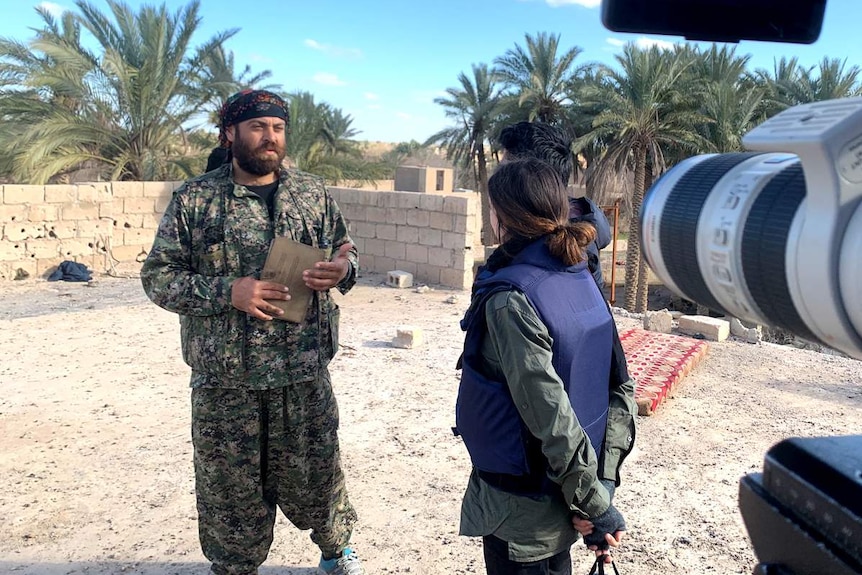 SDF Commander Simko Shikaki talks to reporter Yaara Bou Melhem.