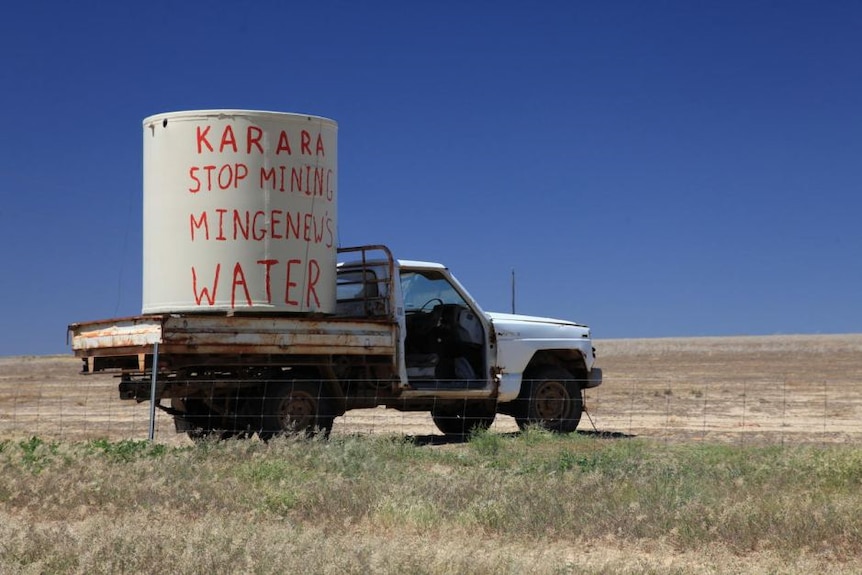 A tank protests a mining water licence application