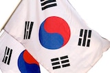 South Korean flags flying in Seoul.