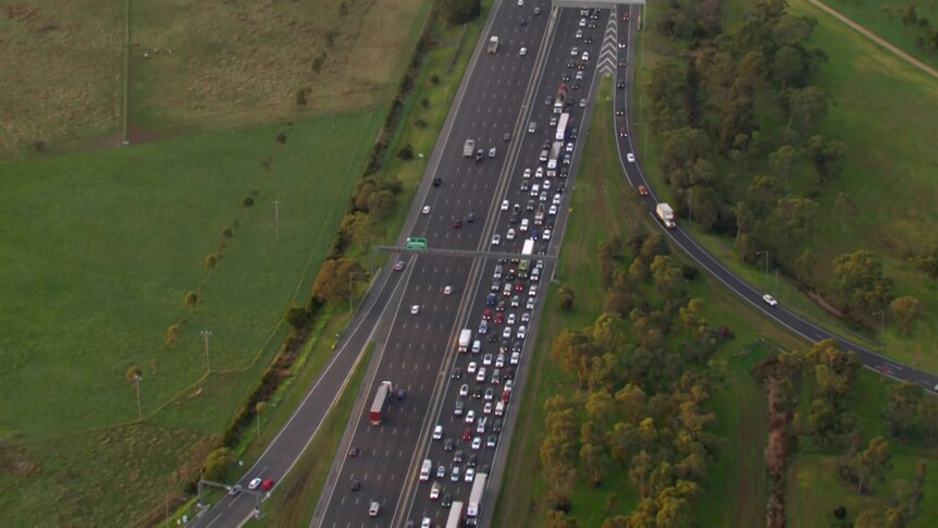 An aerial photo of a congested freeway.