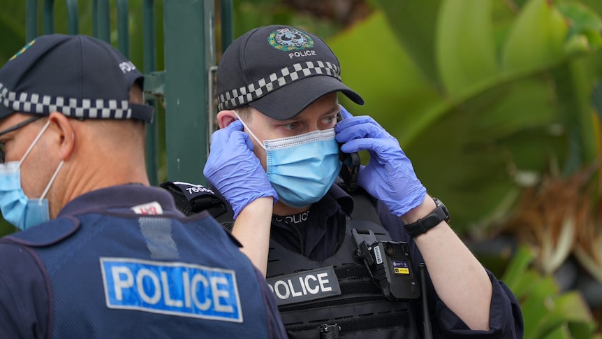 An SA Police officer on the phone.