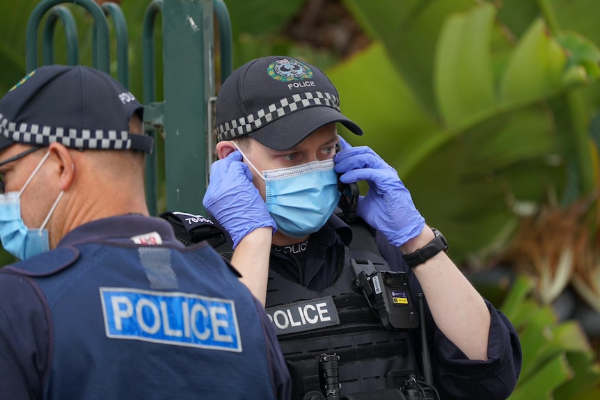 An SA Police officer on the phone.