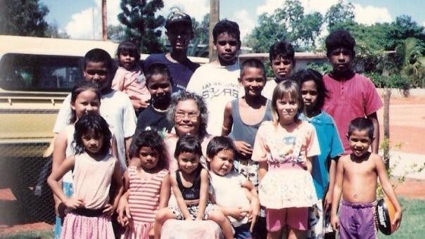 Brenton McKenna in a large family group with his Nan in Broome