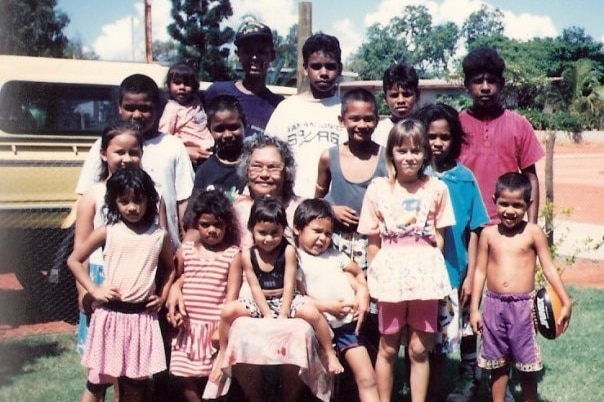 Brenton McKenna in a large family group with his Nan in Broome