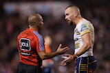 Clint Gutherson talks to the referee