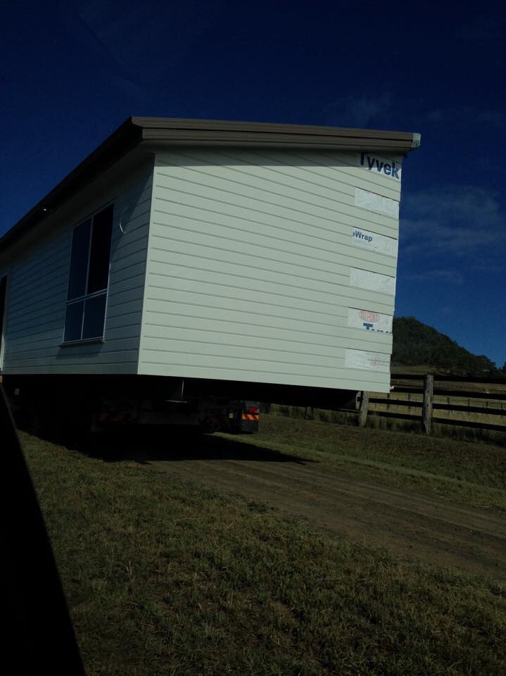 Half a house on a truck