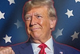 Donald Trump in front of a background of white stars on blue stripes.
