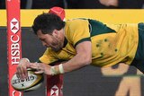 Adam Ashley-Cooper scores a try against the All Blacks