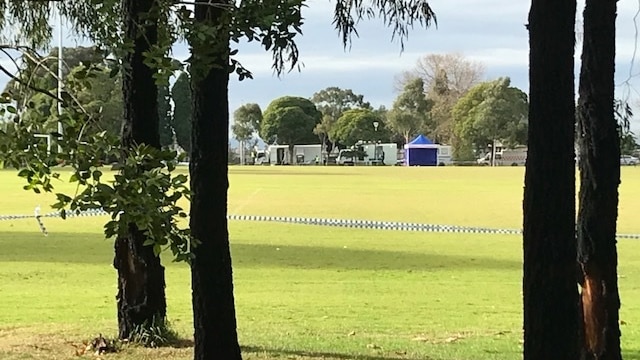 Police tape near the area a woman's body was found on a soccer pitch at Princes Park in Melbourne's north.