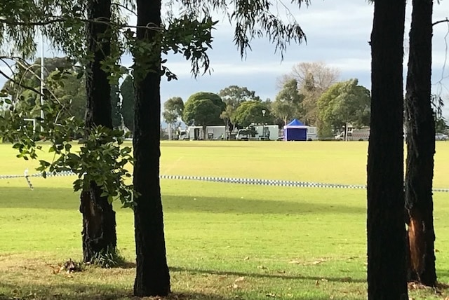 Police tape near the area a woman's body was found on a soccer pitch at Princes Park in Melbourne's north.