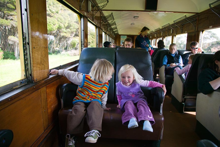 Kids and families enjoying the steam trip to Coles Beach