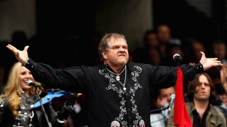 AFL CEO Andrew Demetriou has defended Meat Loaf's pre-game performance before the grand final at the MCG.