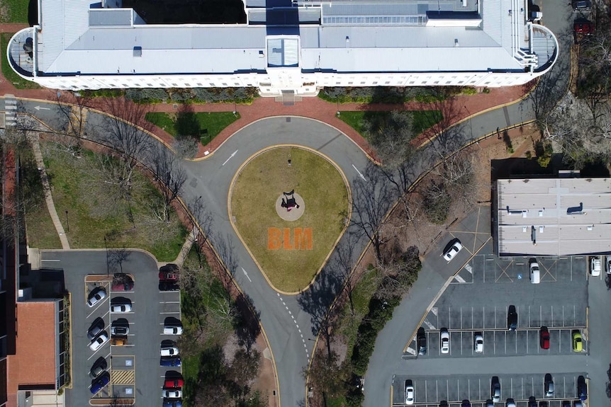 The letters BLM written in the middle of a roundabout at the Australian National University.