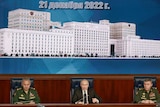 Russian president Vladimir Putin seated centre, left is Defence Minister Sergei Shogiu, right is army chief Valery Gerasimov.