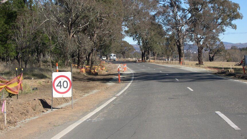 40km speed limit signs at road works near Wamboin in southern NSW. Generic rural road works. July 2012.