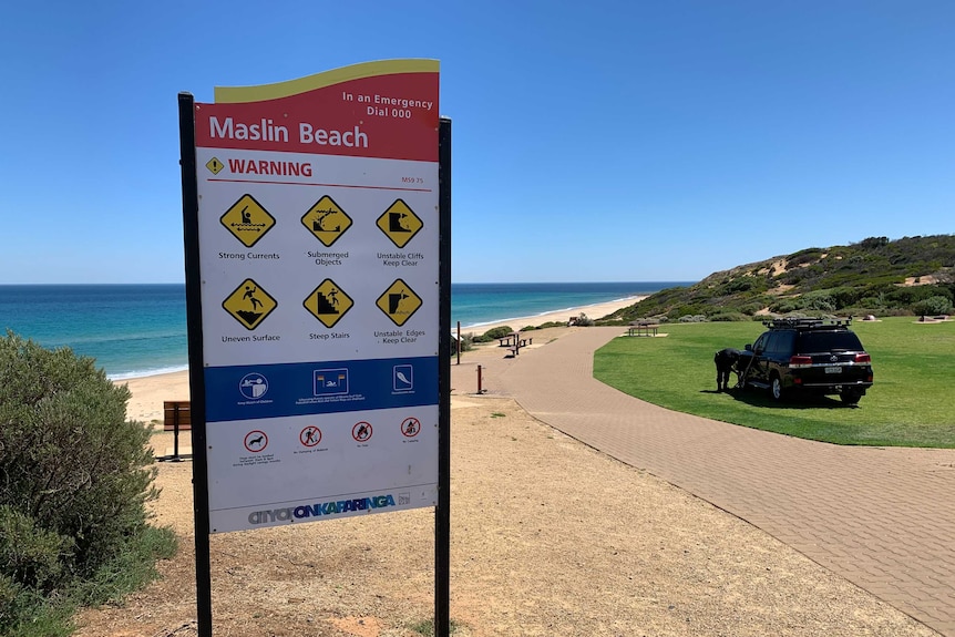 A sign at Maslin Beach south of Adelaide.