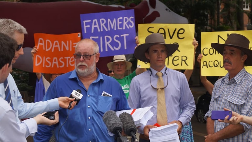 Farmers deliver anti-Adani petitions to Queensland Parliament