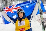 Jakara Anthony holds an Australian flag