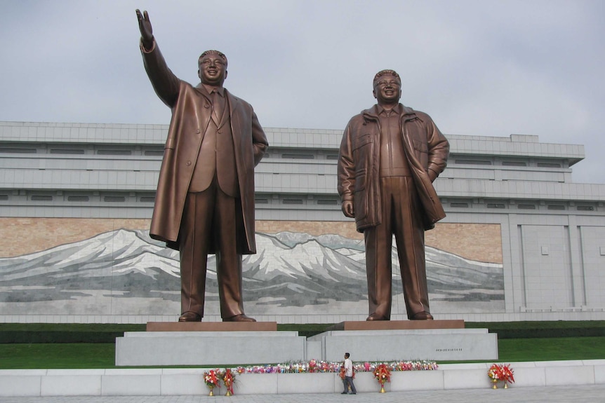 The Mansudae Grand Monument, a pair of giant bronze statues of Kim Il-sung and Kim Jong-il.