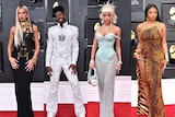 composite image of Dua Lipa, Lil Nas X, Doja Cat and Megan Thee Stallion posing on the grammys red carpet