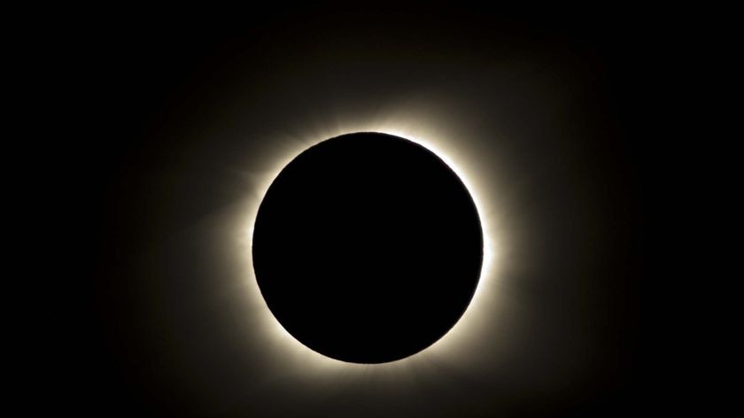 The sun is covered by the moon on Easter Island during a total eclipse