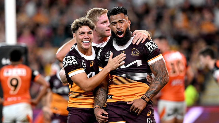 Reece Walsh congratulates Payne Haas after a Brisbane Broncos try.
