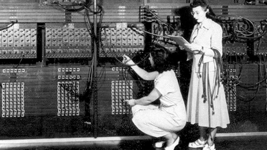 Two women working with the giant Electronic Numerical Integrator And Computer in 1946