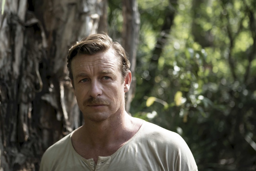 A still from the film High Ground of actor Simon Baker in 1930s Arnhem Land