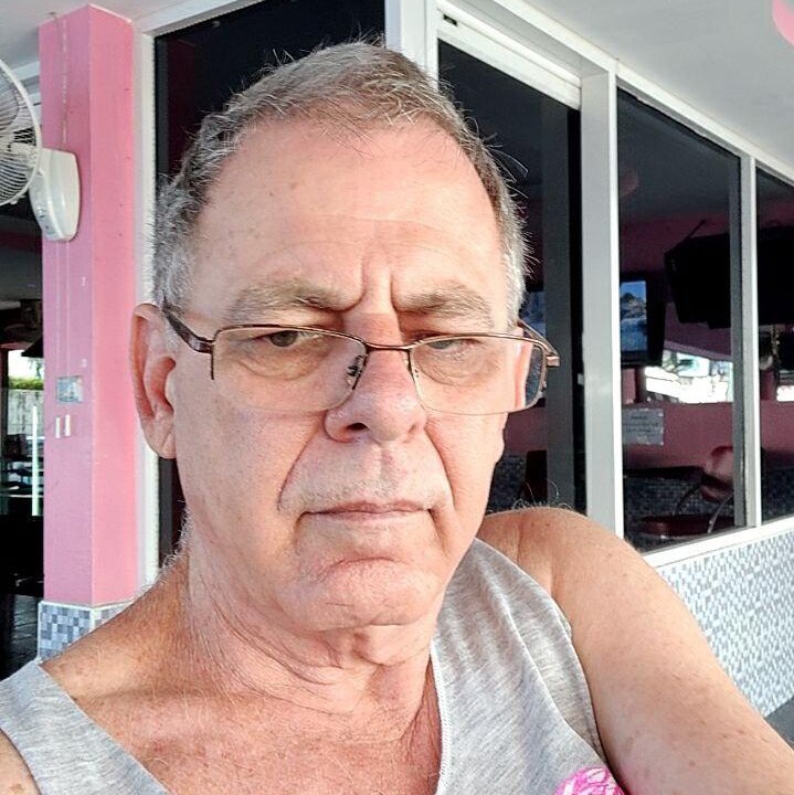 Mark Horrocks takes a selfie in a restaurant in Thailand.