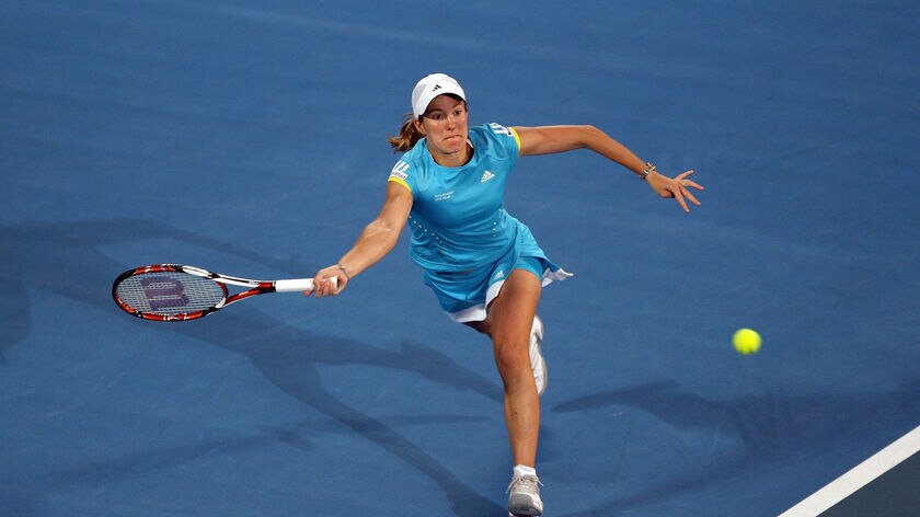 Justine Henin stretched during her Sydney International final win over Svetlana Kuznetsova.