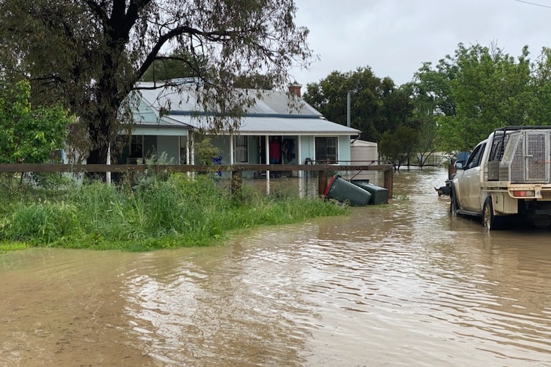 a home with flood water up to its front door