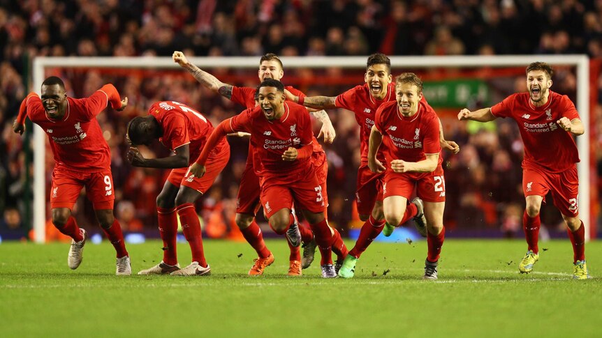 Liverpool celebrates penalty win over Stoke