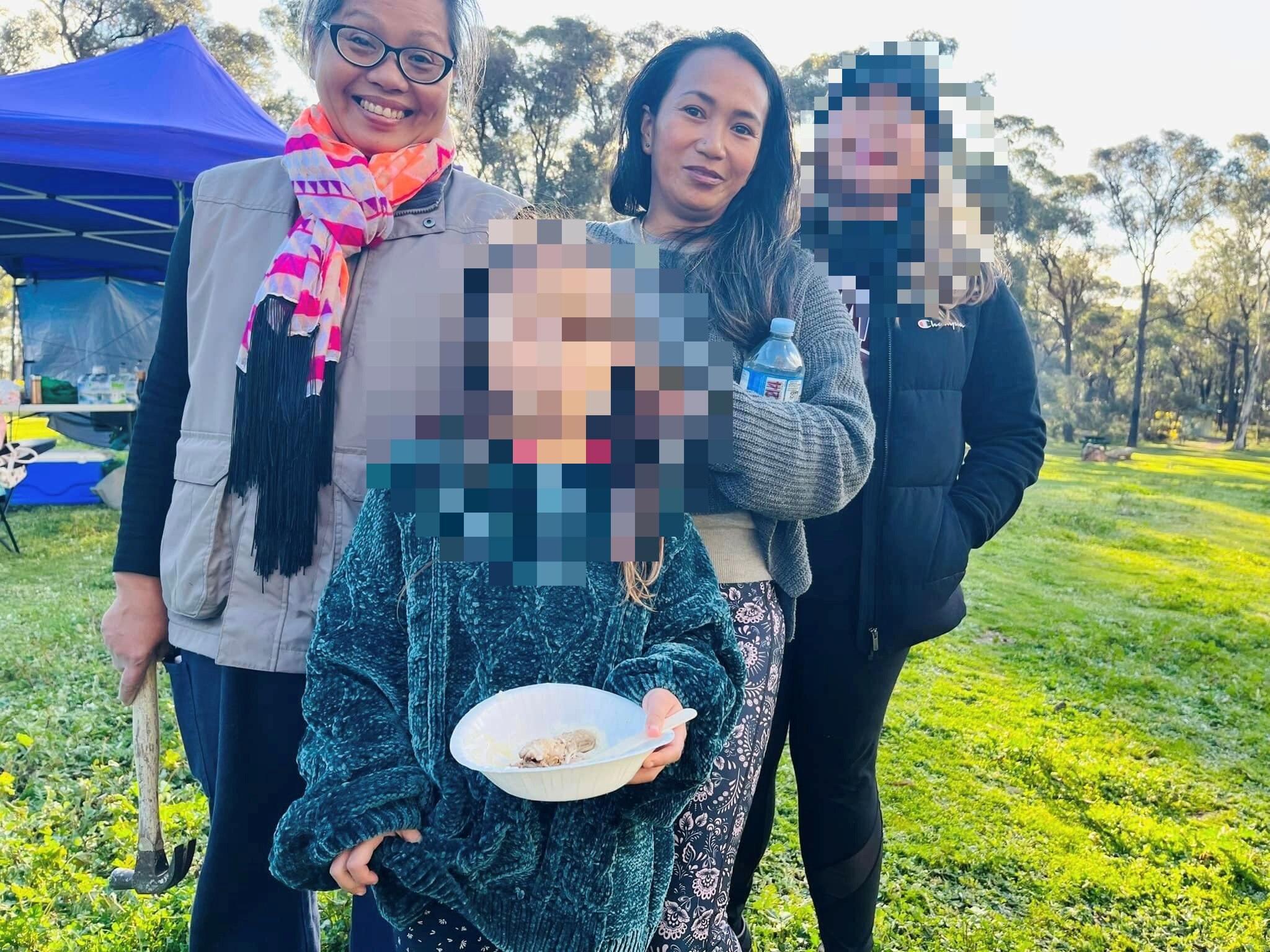 Two Filipina ladies smile for a photo