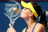 Radwanska celebrates with Montreal WTA trophy