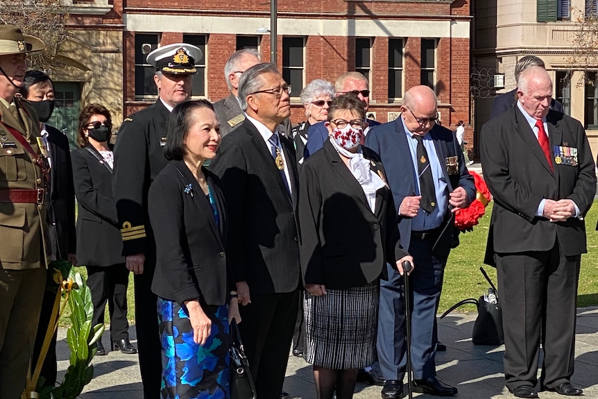 SA Governor Hieu Van Le surrounded by dignitaries.