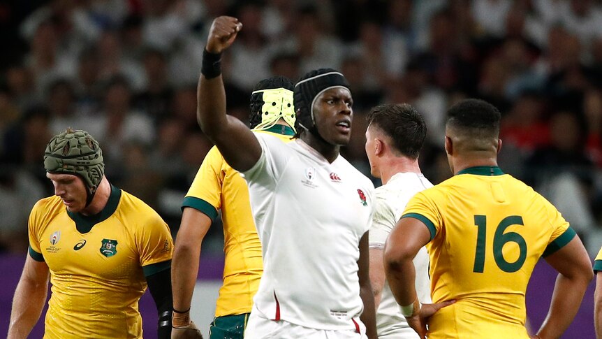 An English rugby union player pumps his right fist during his side's win over Australia at the Rugby World Cup.