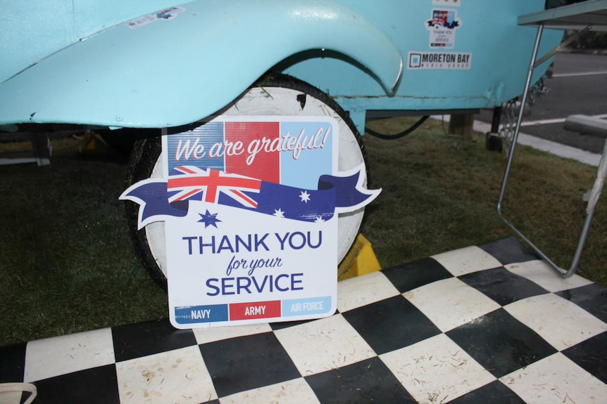 A sign outside the Kool Beans Coffee coffee trailer, thanking veterans.