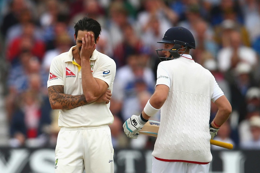Australia's Mitchell Johnson reacts as England's Joe Root runs between the wickets at Trent Bridge.
