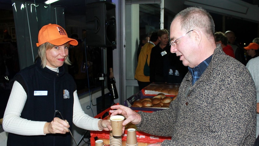 Opposition leader Eric Ripper gets a cup of soup