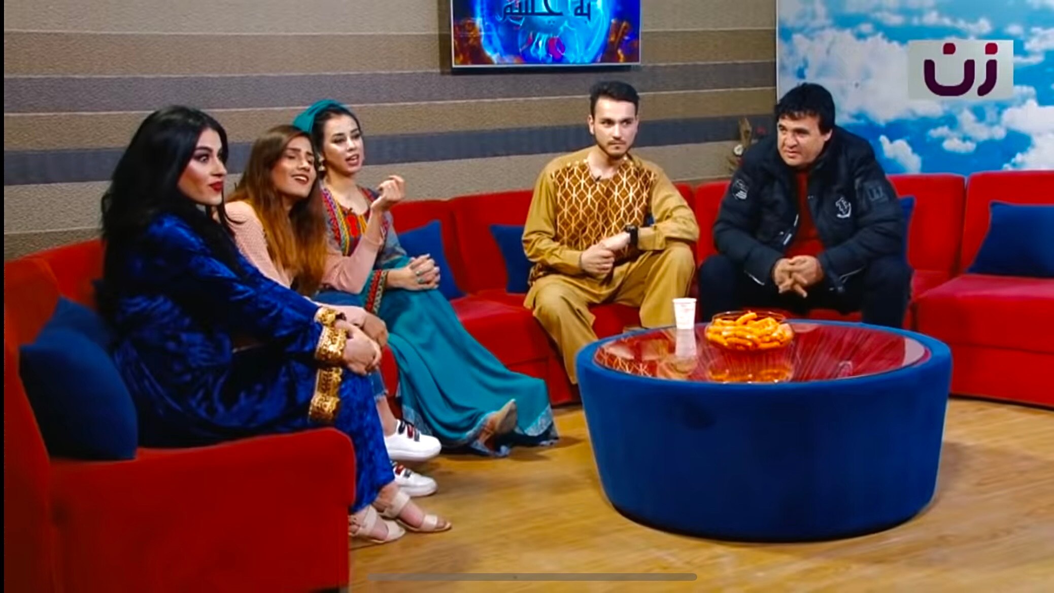 Afghan women and men on the set of Afghan TV show, Afghan Big Brother 